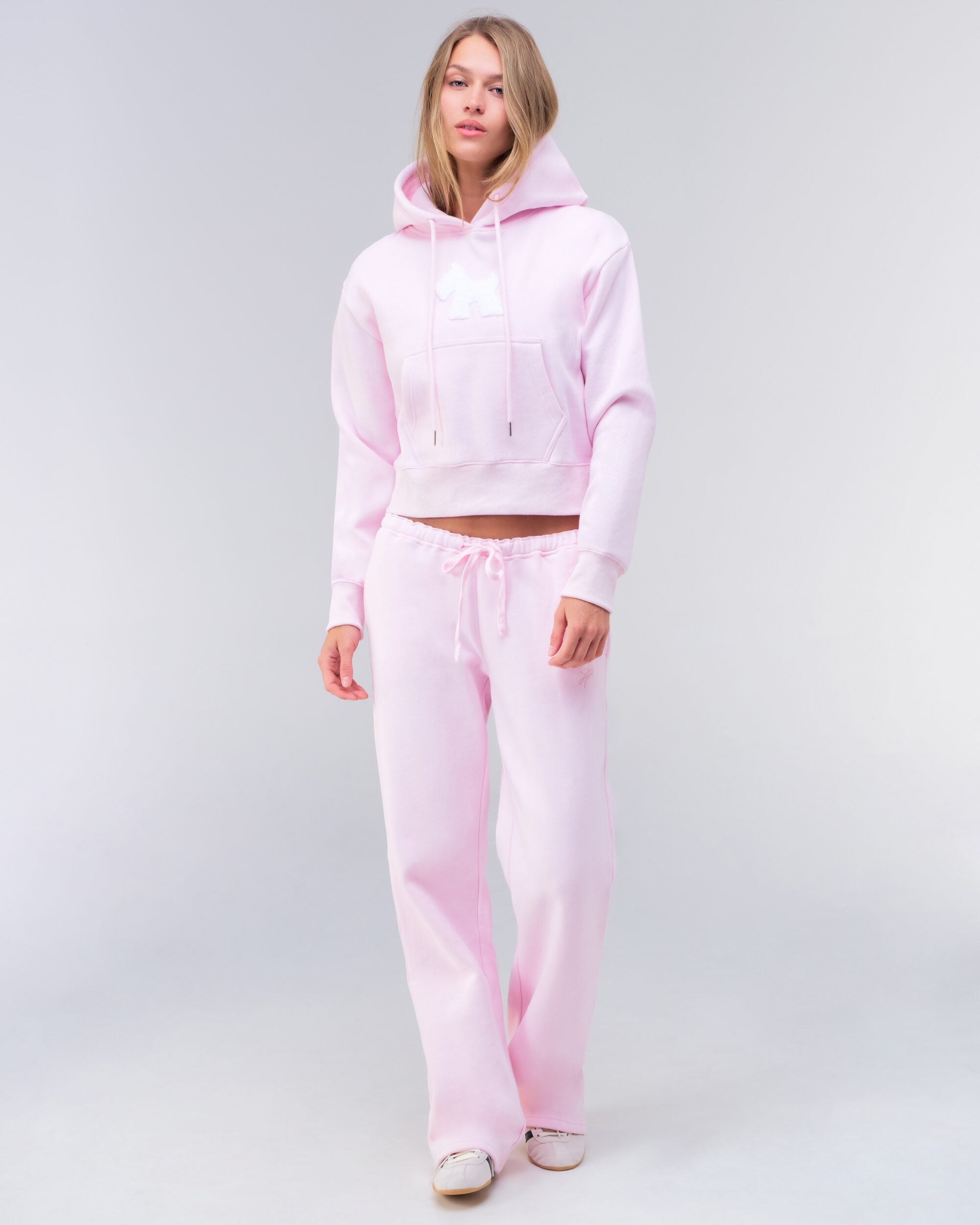 Emely cropped pullover hoodie in baby pink, full body front view