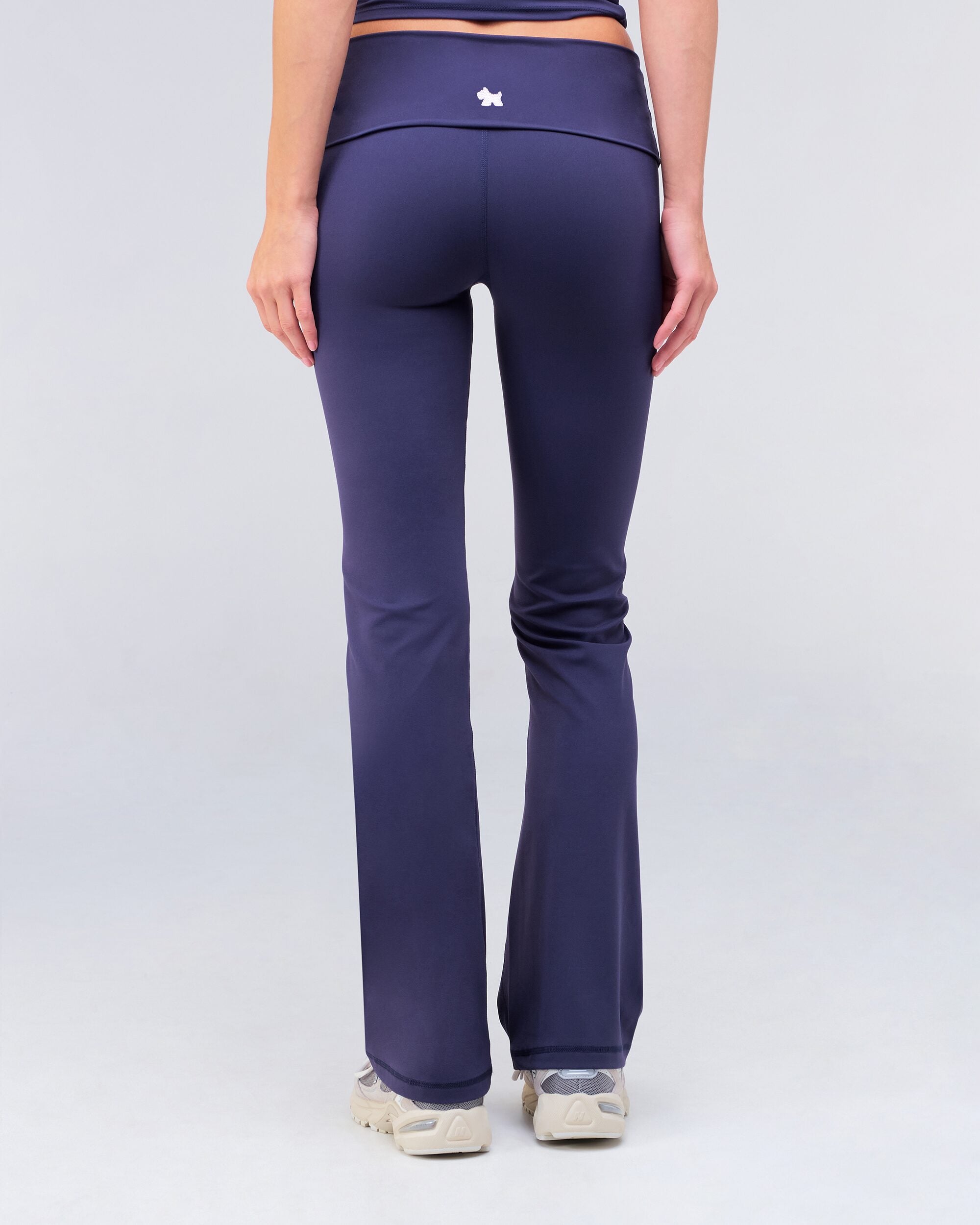Andy fitted turnover flare pant in navy, back view
