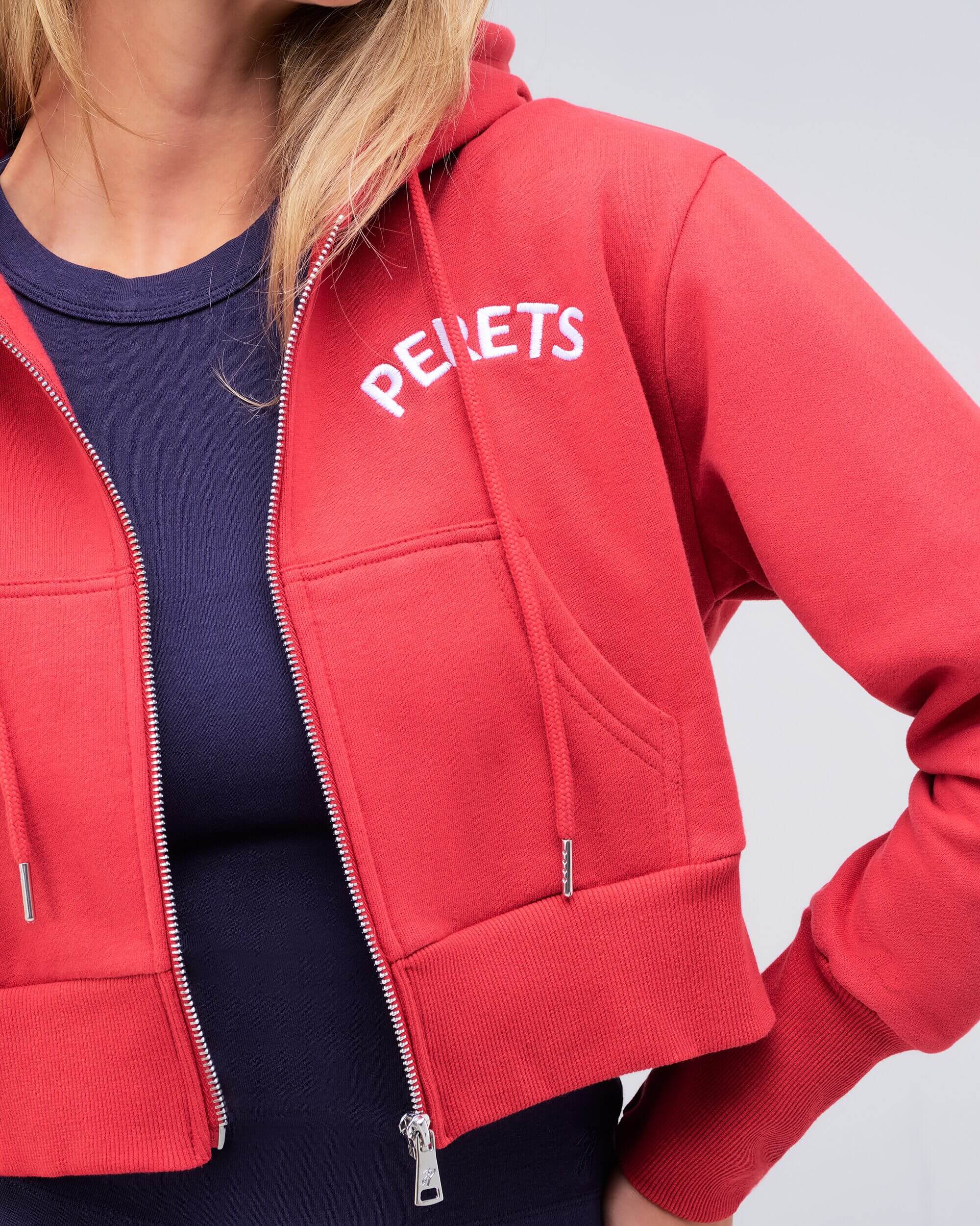 Berkley semi-fitted cropped zip-up hoodie in red, close-up of zip
