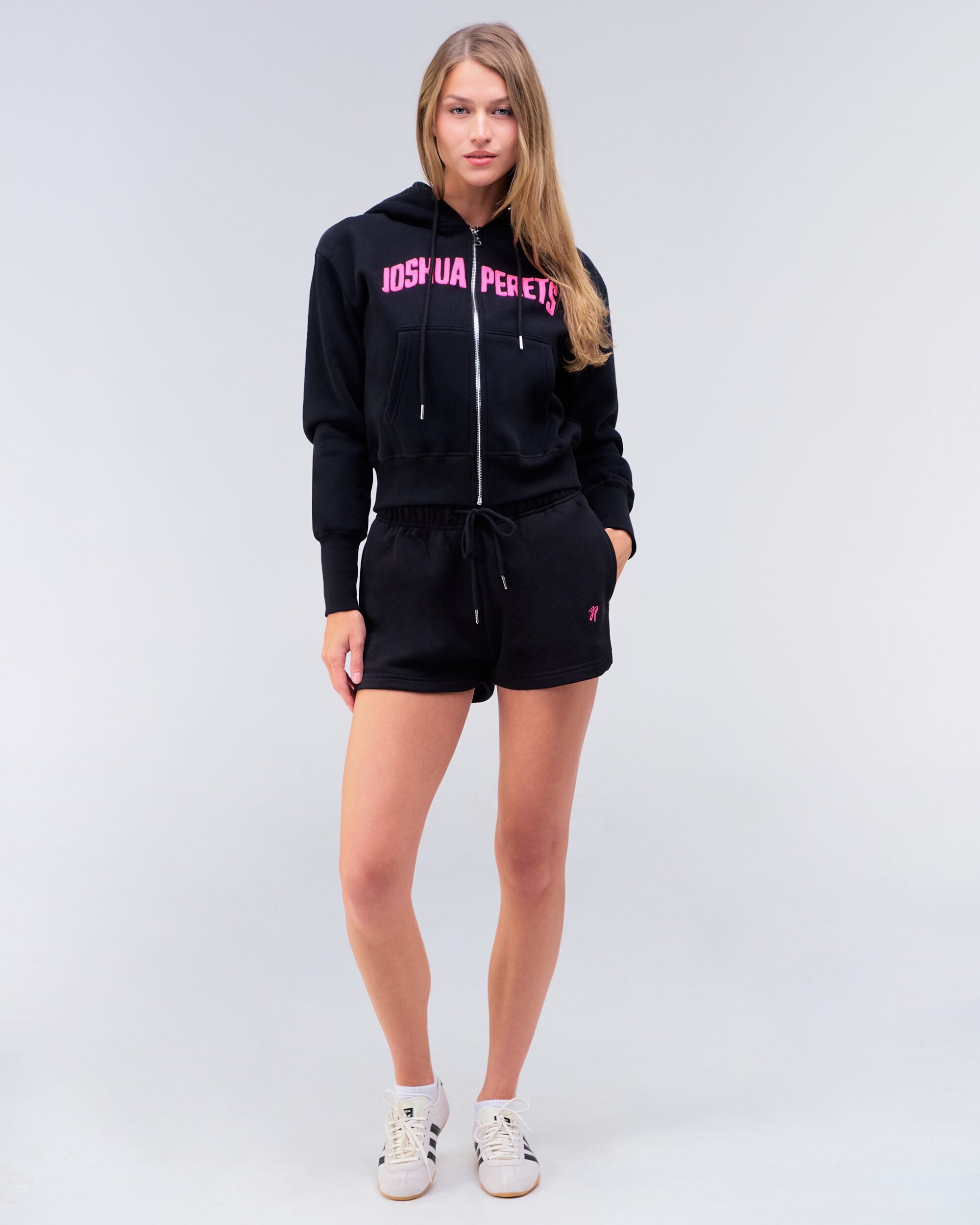 Danna relaxed sweat short in black, styled with zip hoodie