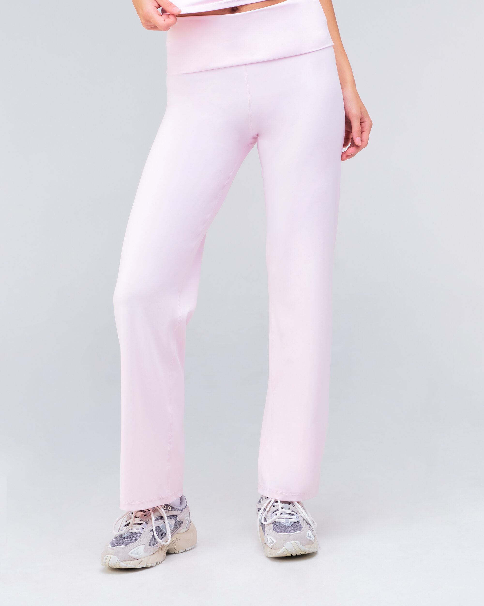 Fresh high-rise loose fit flare pants in baby pink, front view