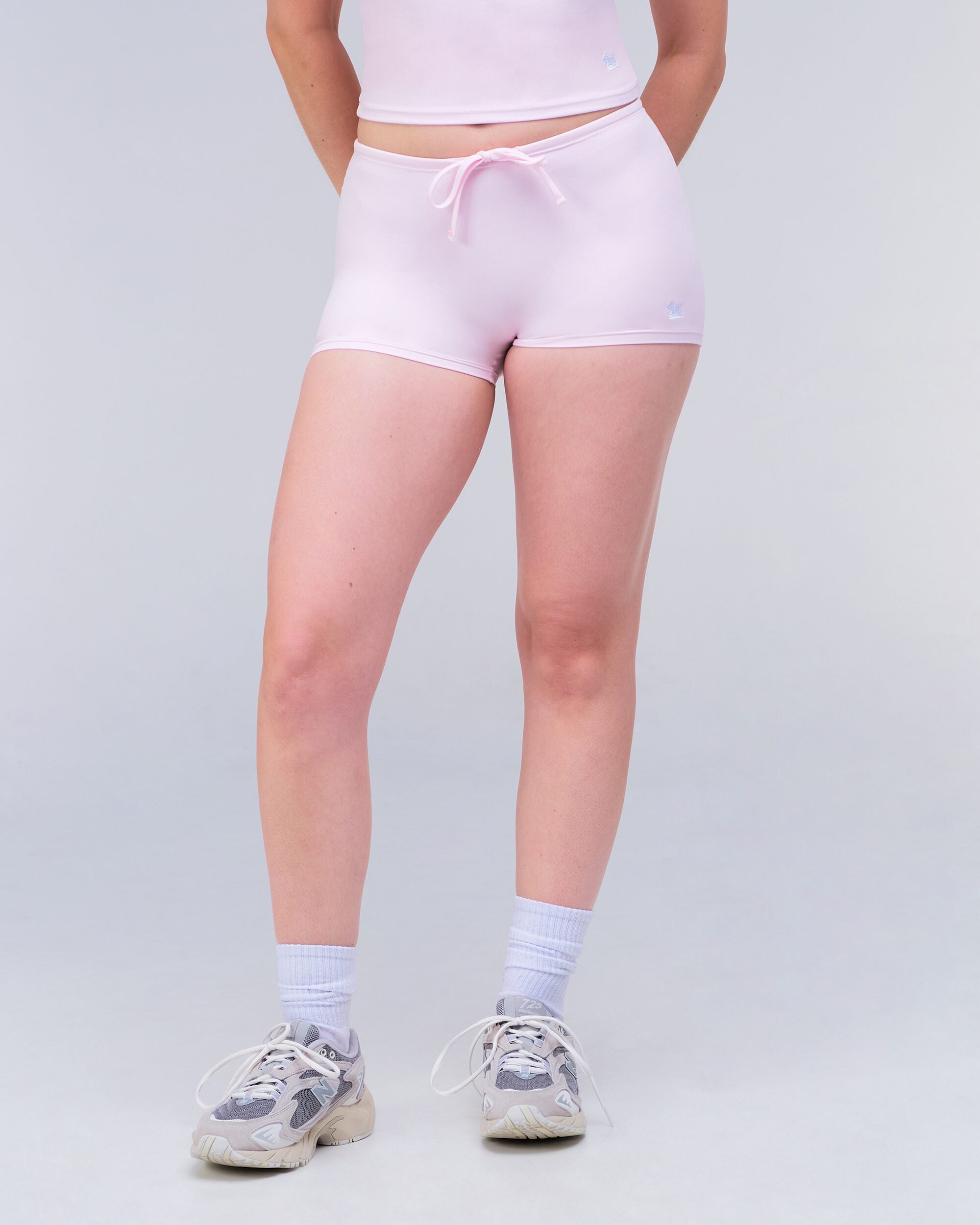 Olive Fitted Low Rise Drawstring Shorts in Baby Pink - front