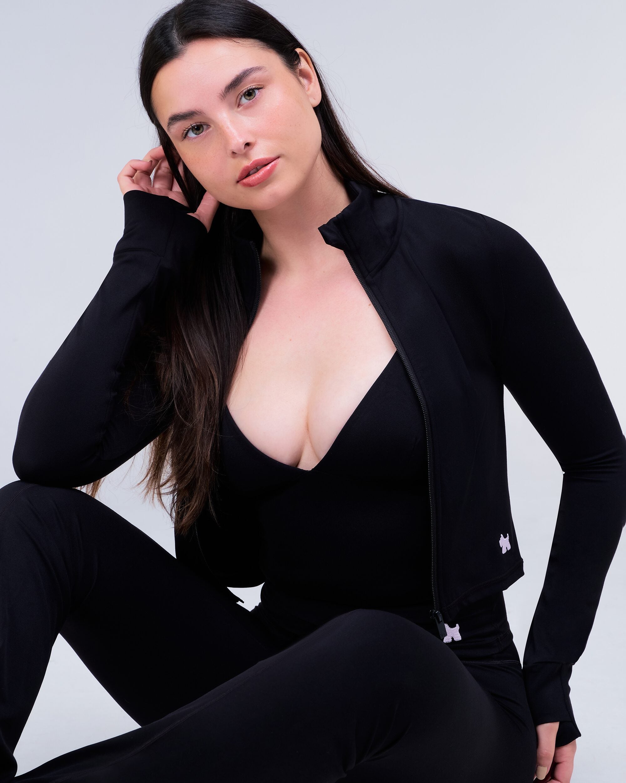 Shay Fitted Mock Neck Zip-Up Long Sleeve Top in Black - seated side