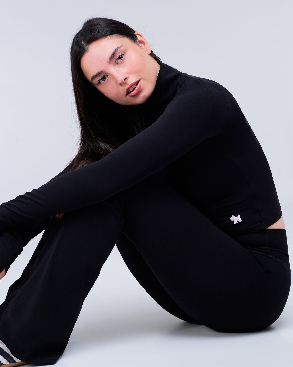 Venus Fitted Flared Leggings in Black - seated