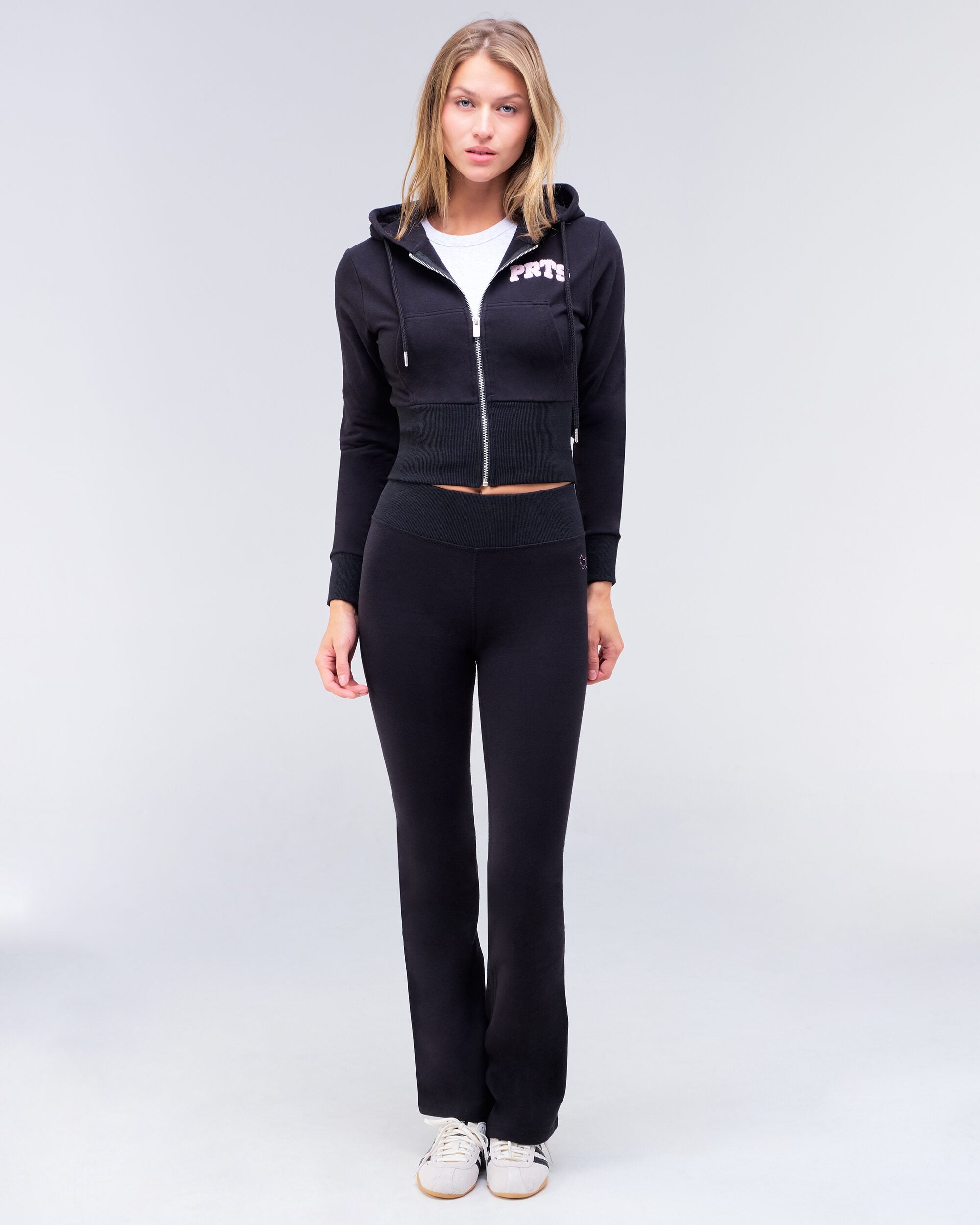 Edith fitted low rise flare pant in black, full body styled with zip hoodie