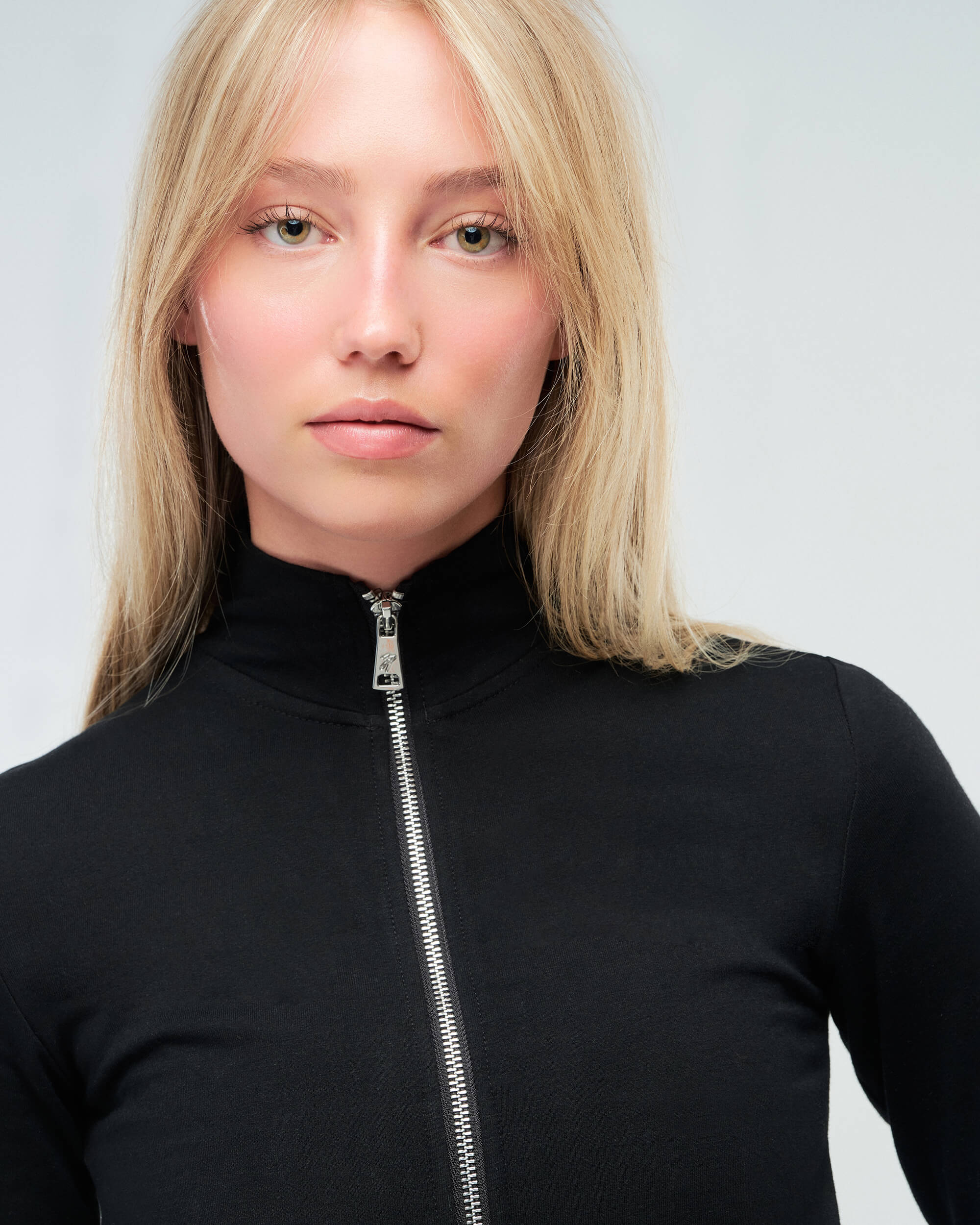 Kyla – Haut ajusté à manches longues zippé et court