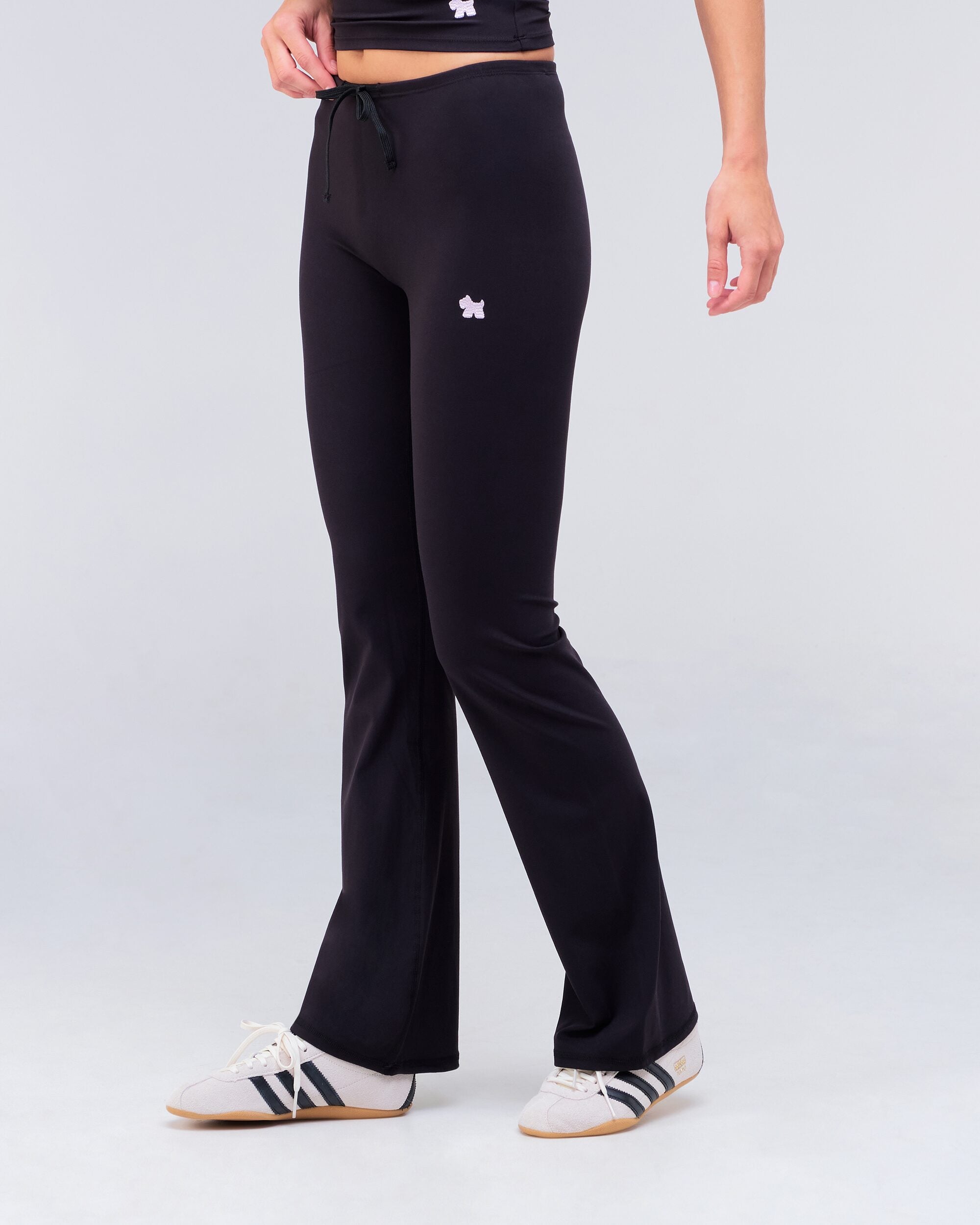 Adley fitted low rise drawstring flare pants in black, front view