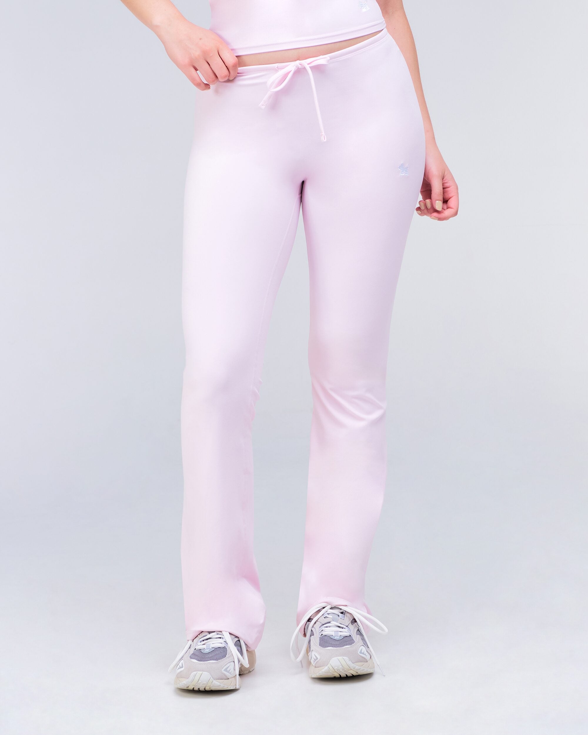 Adley Fitted Low Rise Drawstring Flare Pants in Baby Pink - front