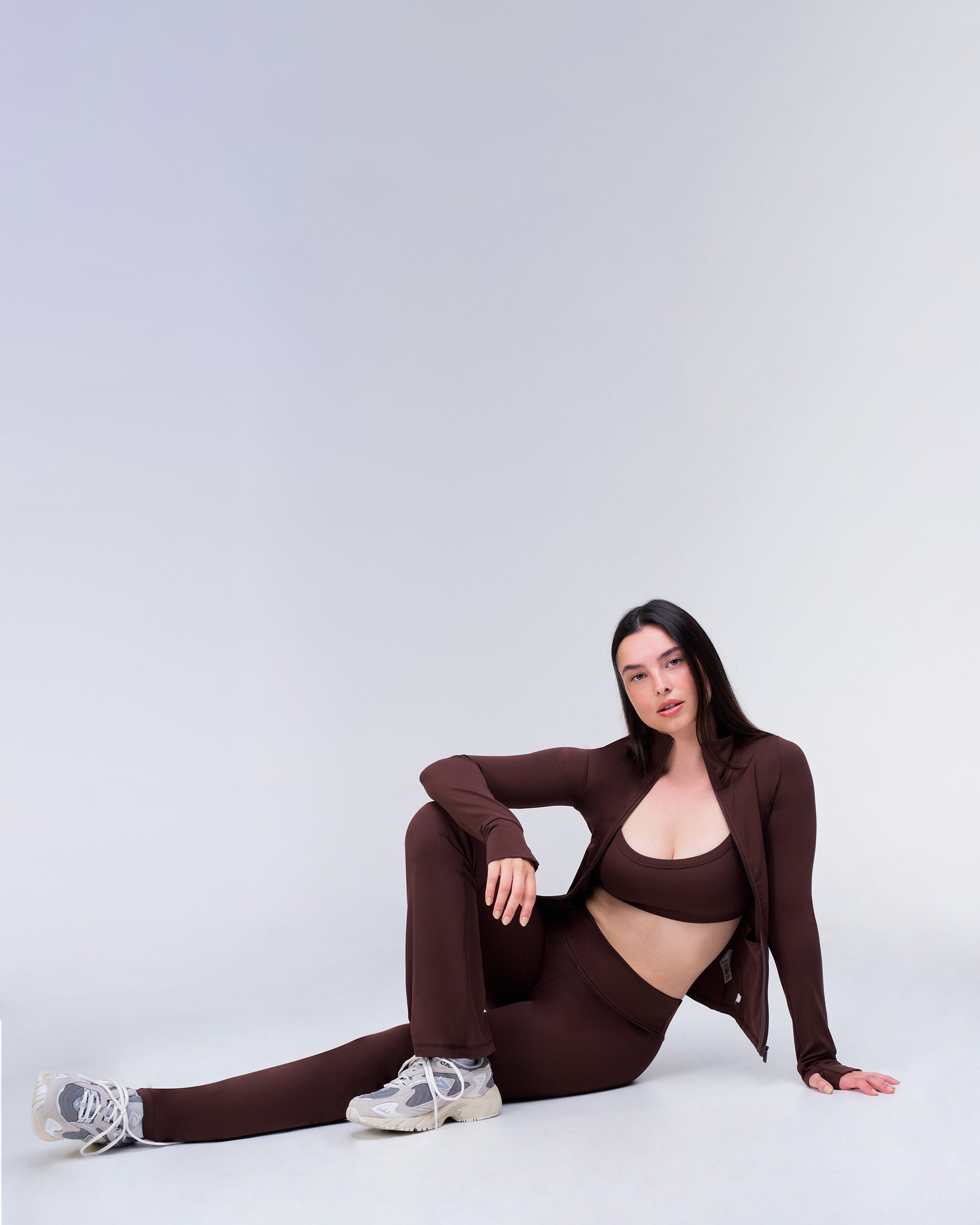 Andy Fitted Turnover Flare Pant in Auburn - seated pose