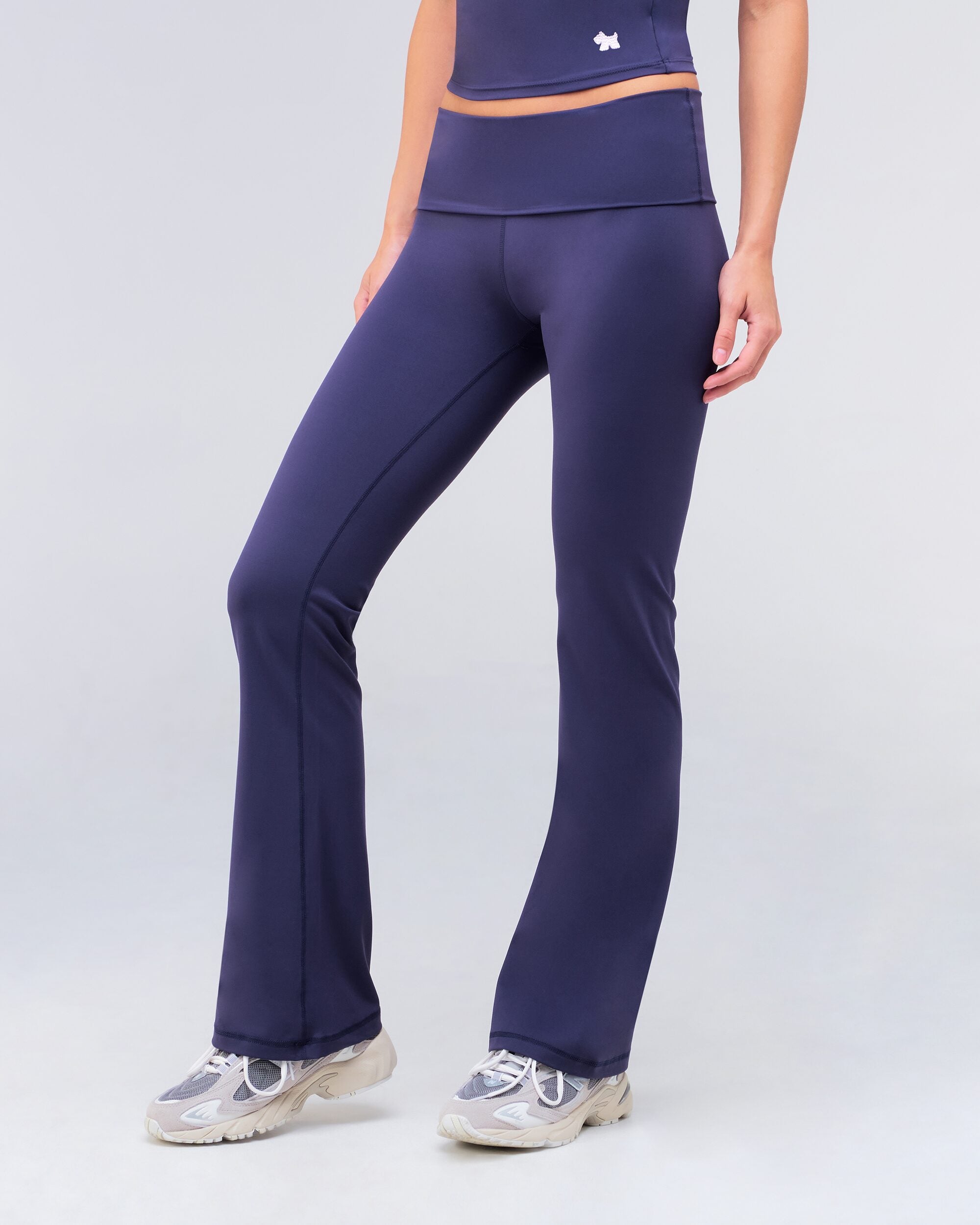 Andy fitted turnover flare pant in navy, side view