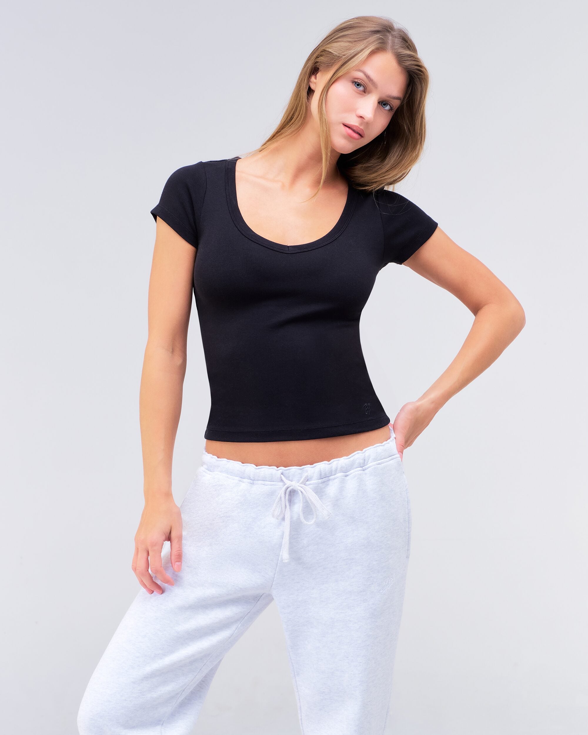 Denise fitted scoop neck tee in black, three-quarter view