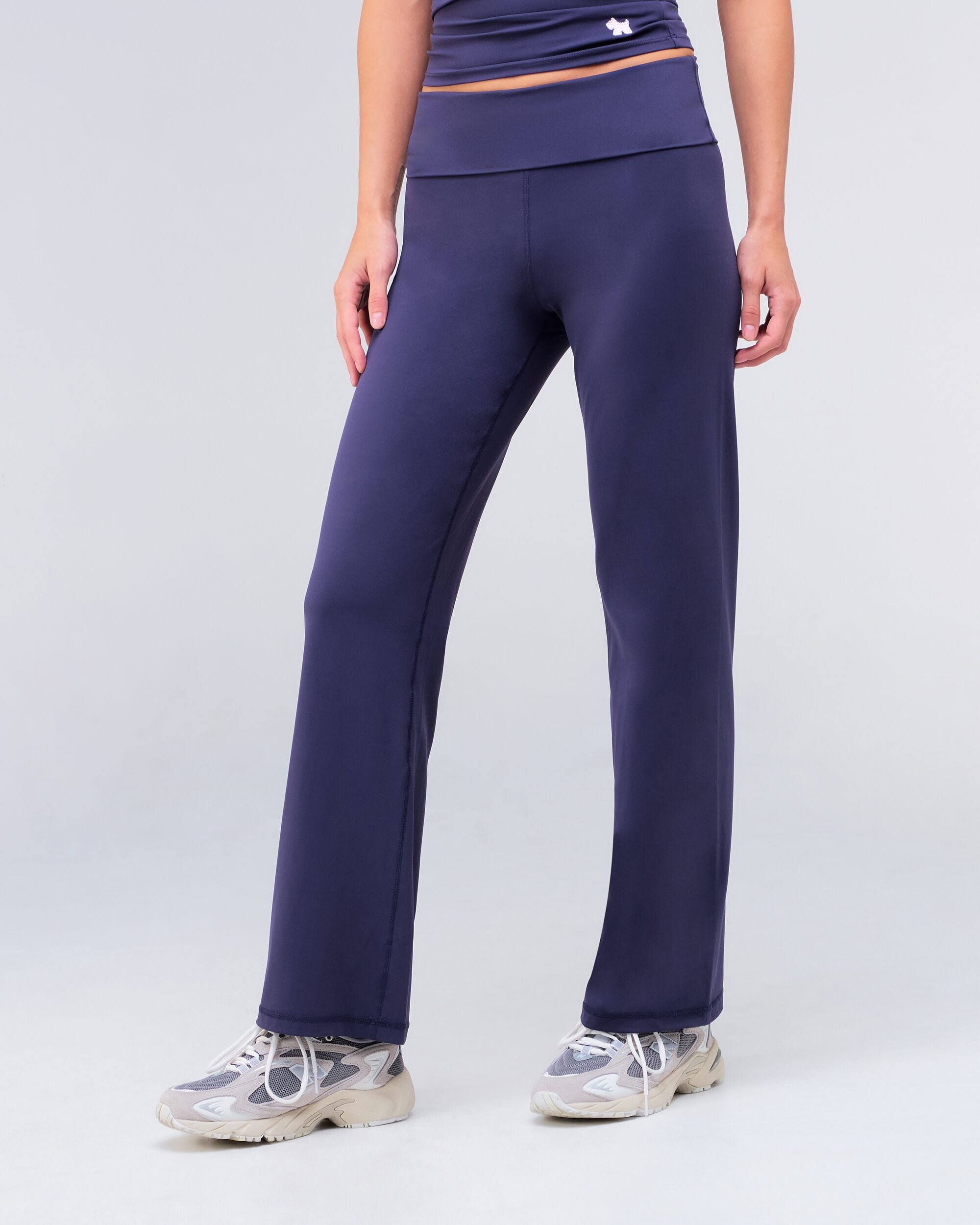 Fresh high-rise loose fit flare pants in navy, walking view