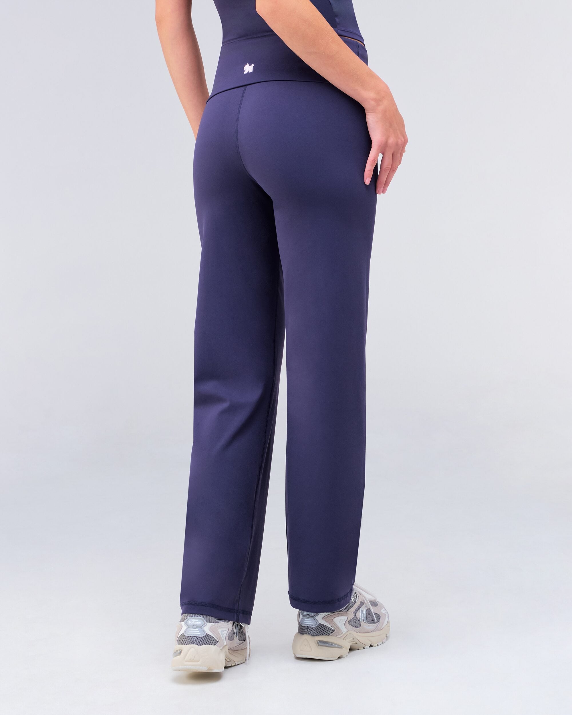 Fresh high-rise loose fit flare pants in navy, back view