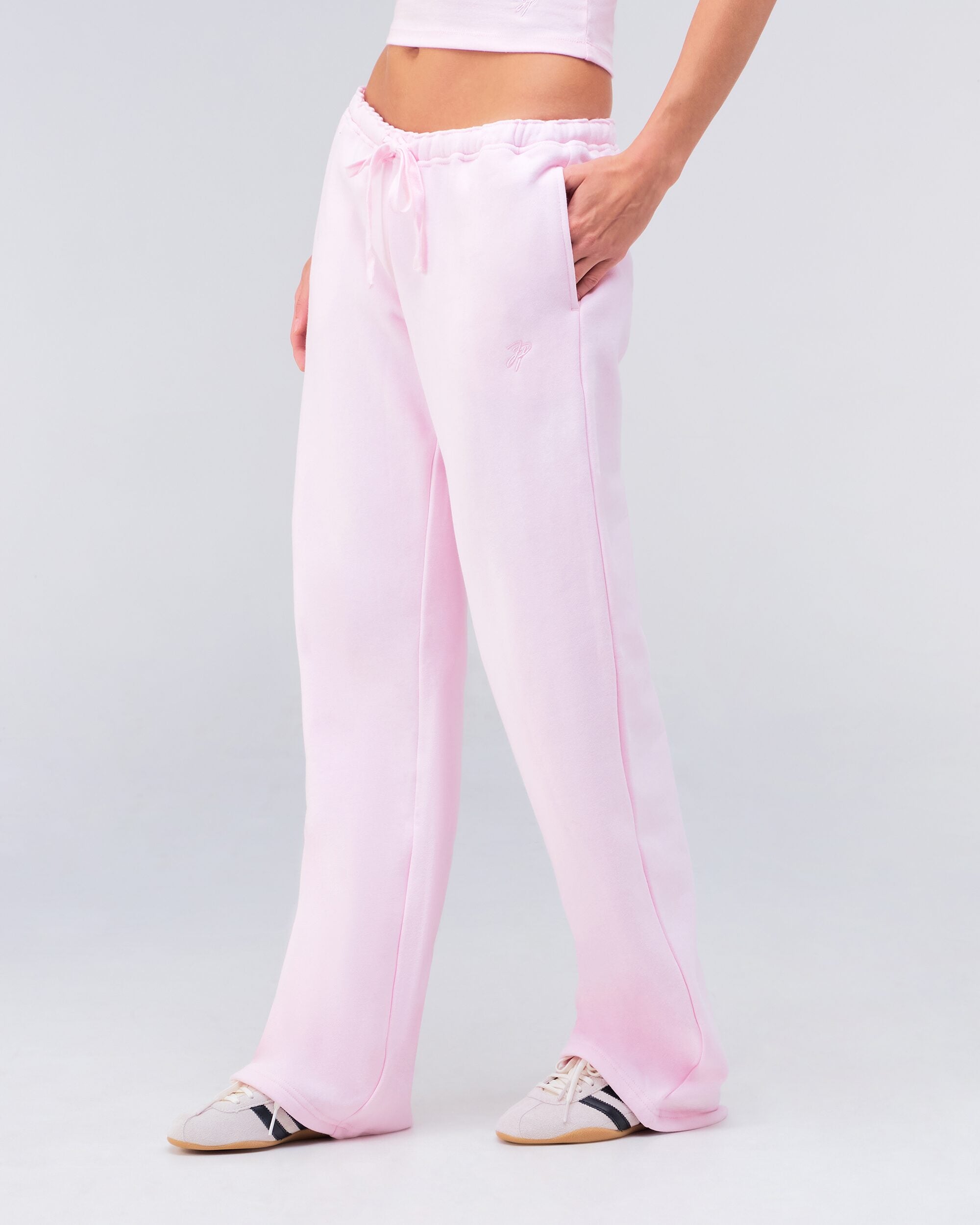 Gia Low-Rise Relaxed Fit Flared Sweatpants in Baby Pink - side