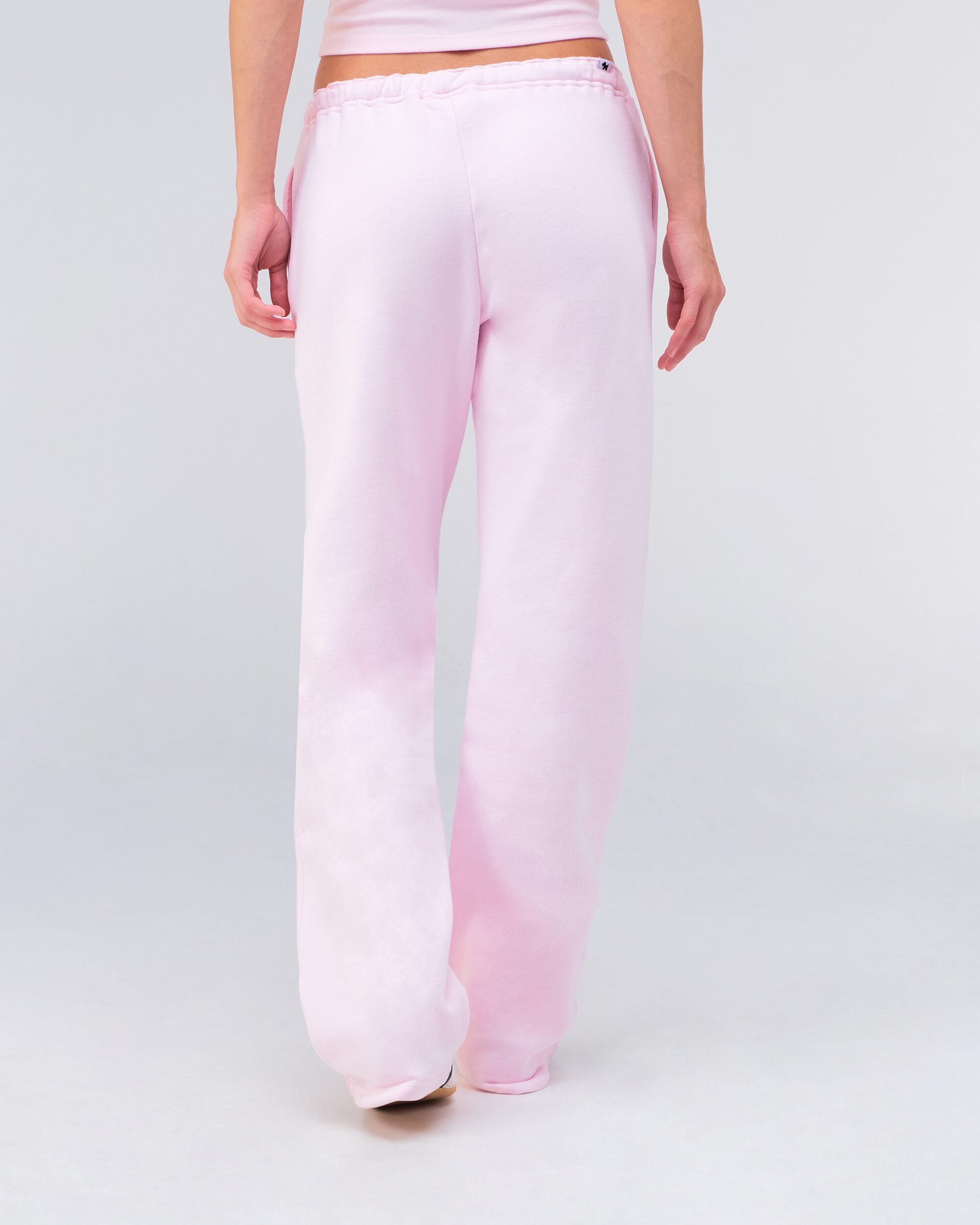 Gia Low-Rise Relaxed Fit Flared Sweatpants in Baby Pink - back