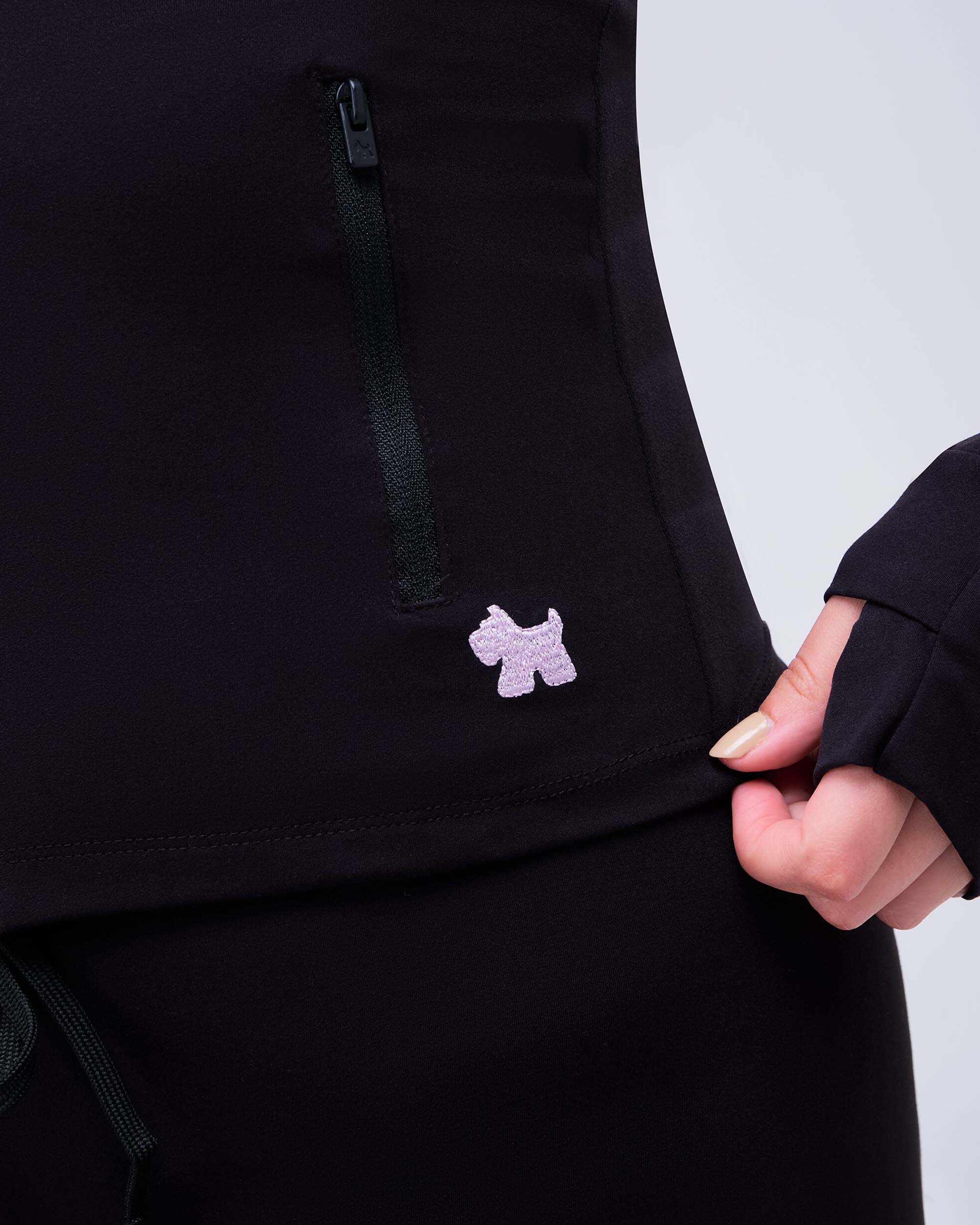 Millie Fitted Mock Neck Zip-Up Long Sleeve Top in Black - pocket logo detail