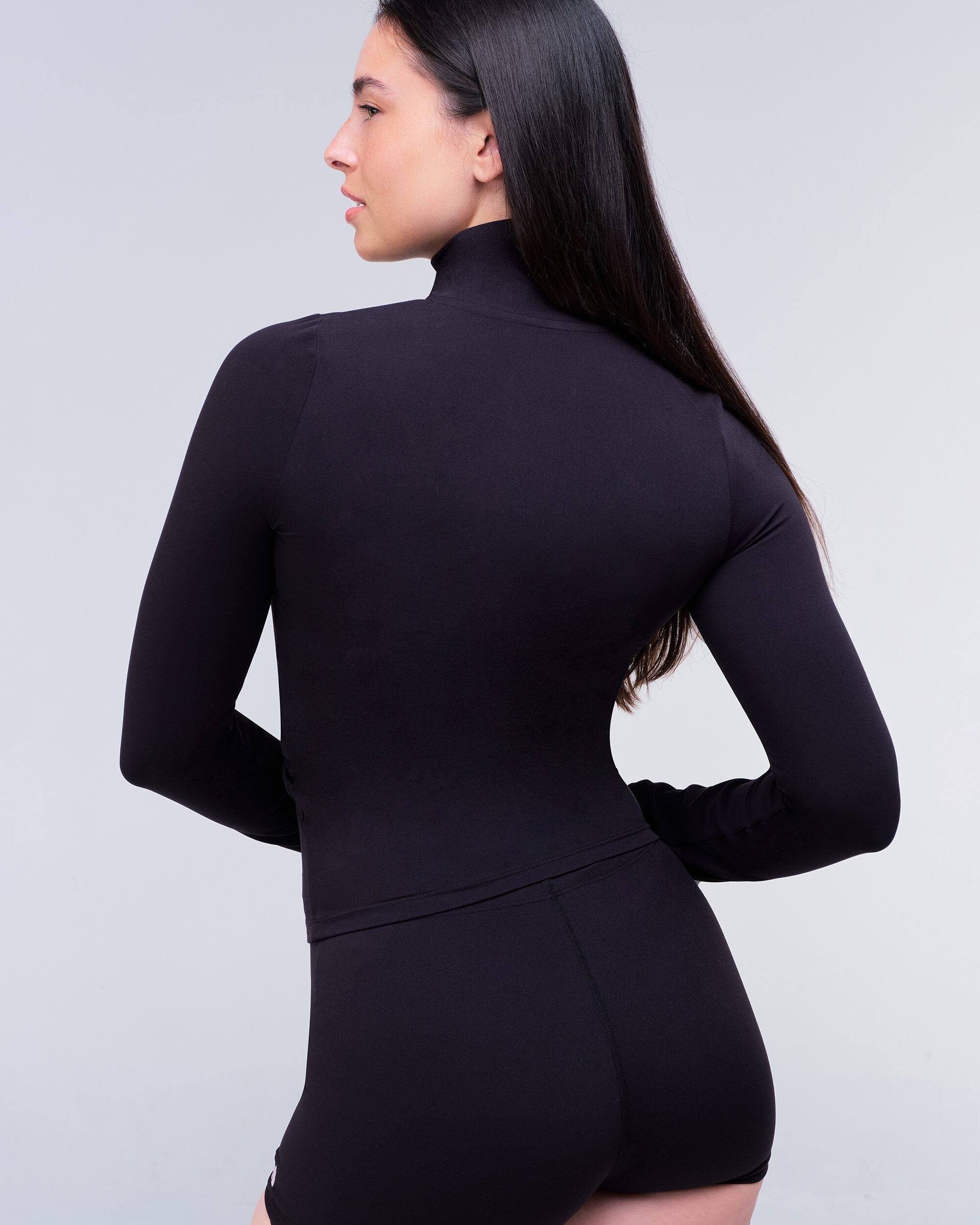 Millie Fitted Mock Neck Zip-Up Long Sleeve Top in Black - back