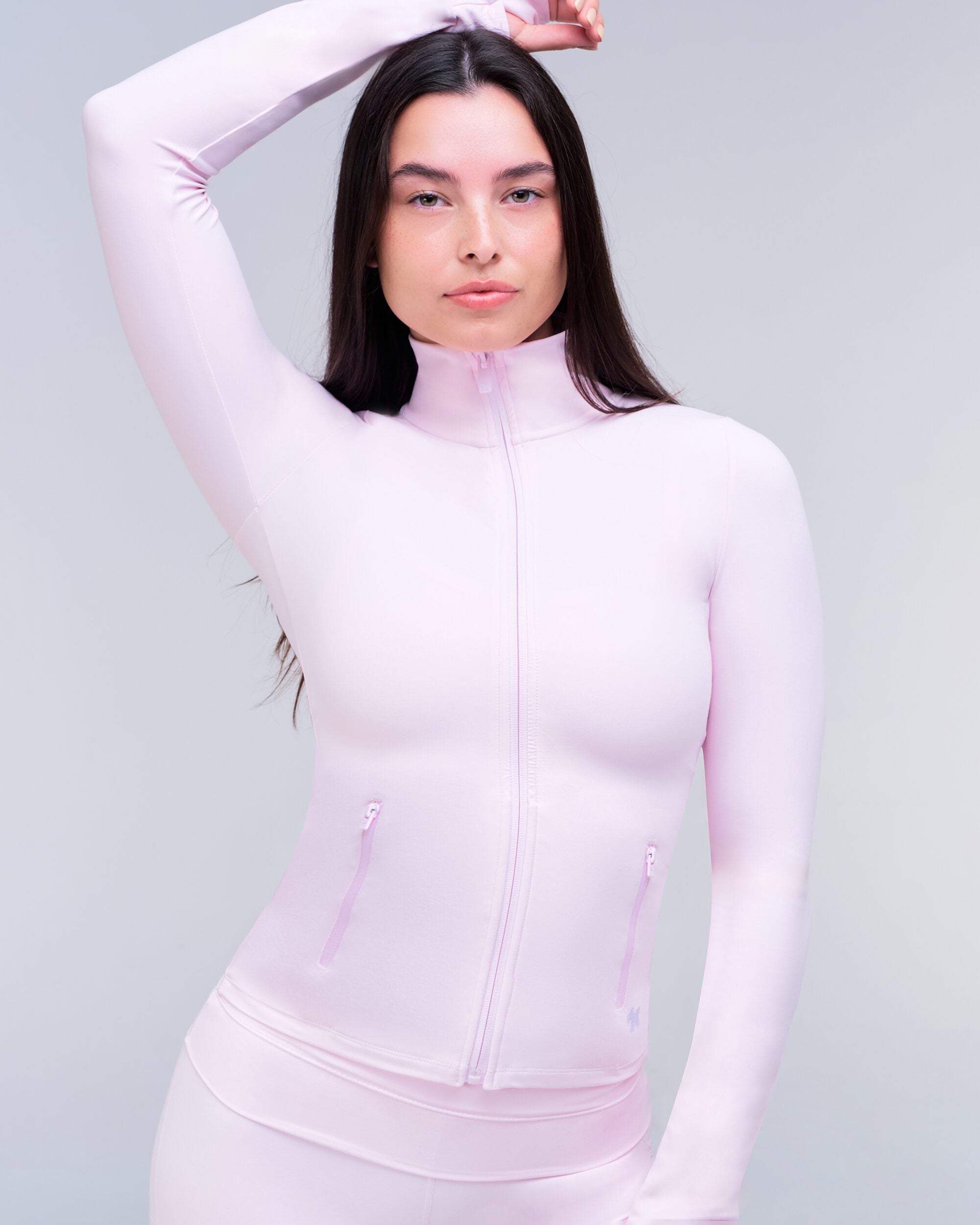 Millie Fitted Mock Neck Zip-Up Long Sleeve Top in Baby Pink - front