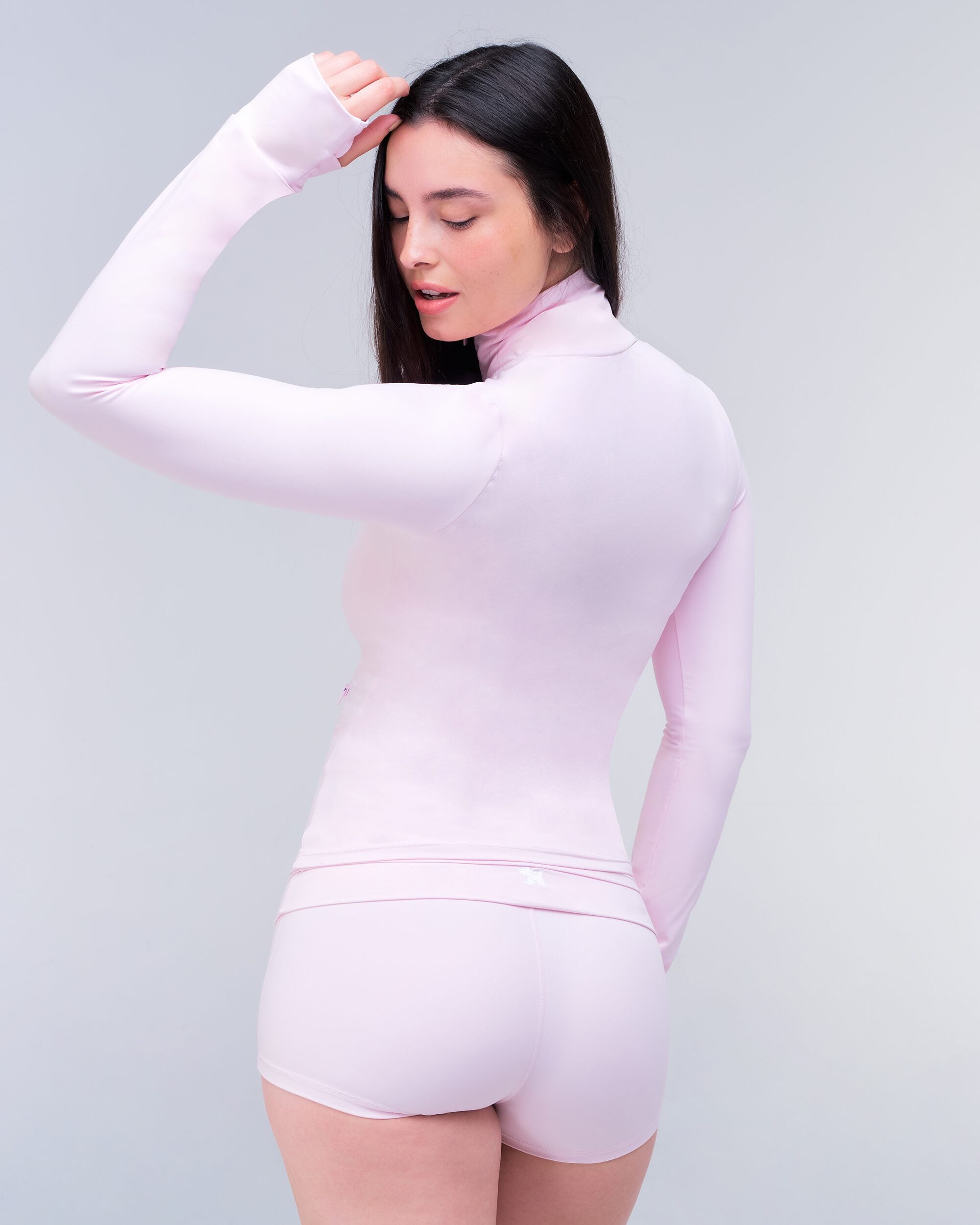 Millie Fitted Mock Neck Zip-Up Long Sleeve Top in Baby Pink - back