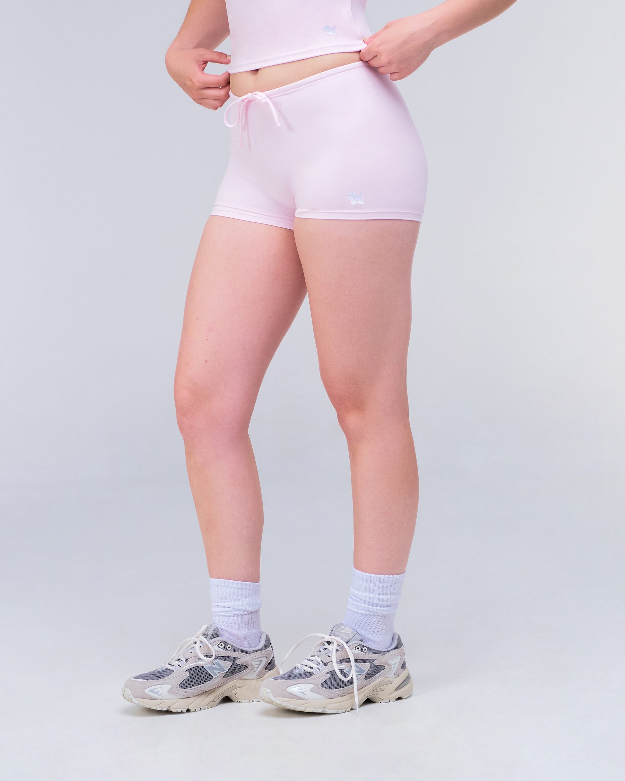 Olive Fitted Low Rise Drawstring Shorts in Baby Pink - side