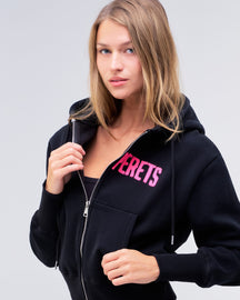 Paige relaxed-fit zip-up hoodie in black with pink logo, front view