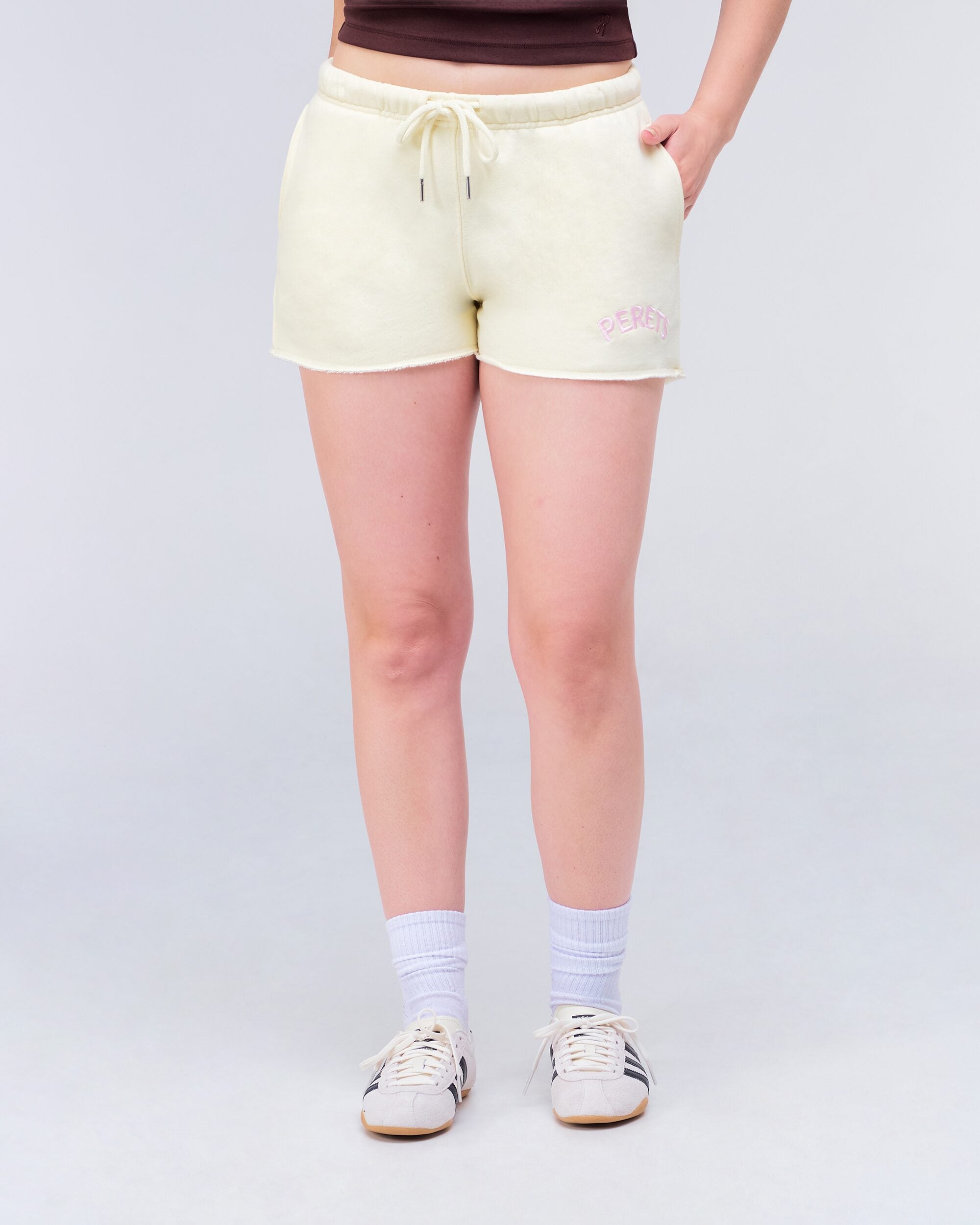 Rosalie Low-Rise Loose Fit Shorts in Yellow - front
